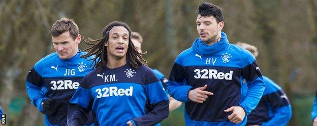 Kevin Mbabu (centre) trains with Rangers