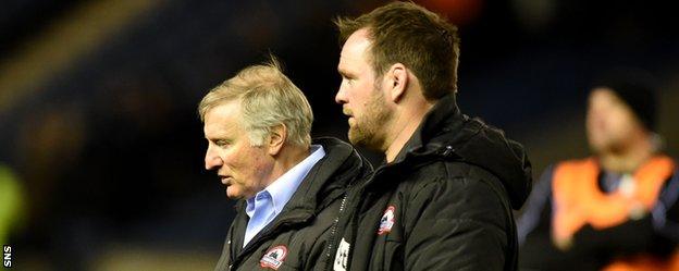 Edinburgh coach Alan Solomons (left) troops off Murrayfield