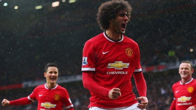 Marouane Fellaini celebrates Manchester United's second goal