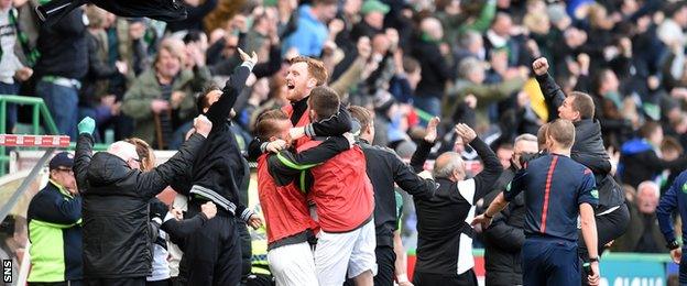 The Hibs bench celebrate after Farid El Alagui sealed the win