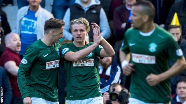 Jason Cummings (centre) scored the opening goal at Easter Road