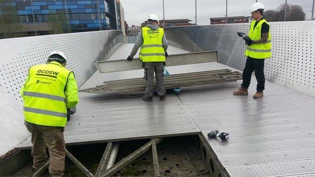 Workers on Meads Reach bridge