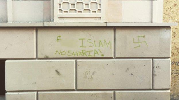 The graffiti, some of which we have blurred out, was written on the wall of the new Gurdwara.