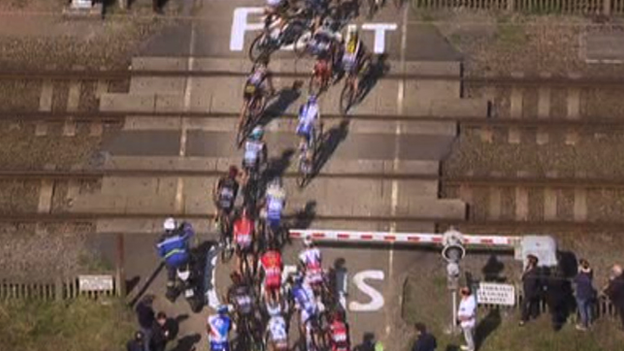 Cyclists narrowly miss high-speed train in Paris-Roubaix race