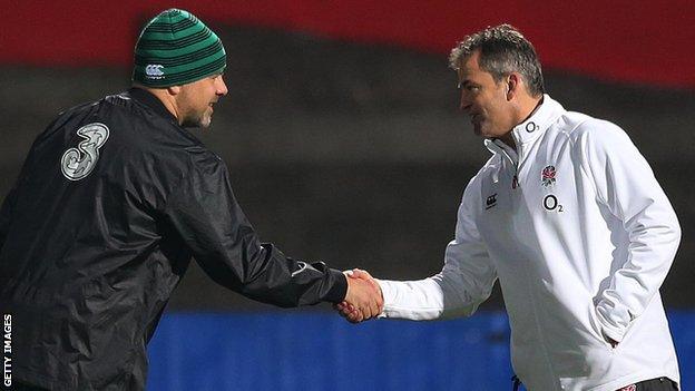 Ireland Wolfhounds coach Dan McFarland shakes hands with Saxons coach Jon Callard