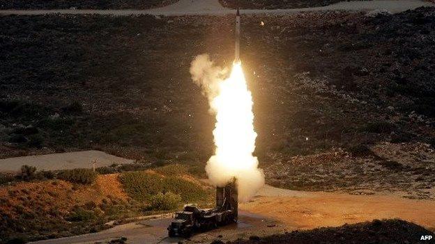 An S-300 PMU-1 anti-aircraft missile launches during a Greek army military exercise near Chania on the island of Crete on December 13, 2013