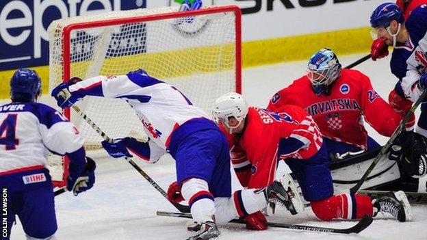 GB ice hockey team score a goal