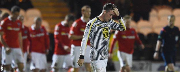 St Mirren midfielder Stevie Mallan shows his disappointment