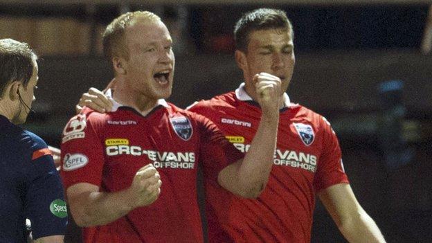 Ross County's Liam Boyce (left) celebrates after completing his hat-trick against St Mirren