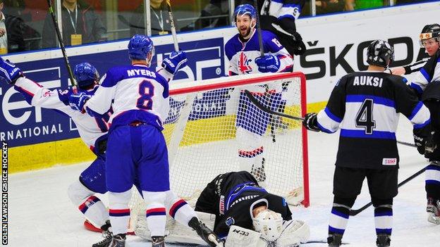 Robert Farmer scores for GB ice hockey