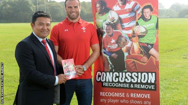 WRU national medical manager Prav Mathema and Wales centre Jamie Roberts