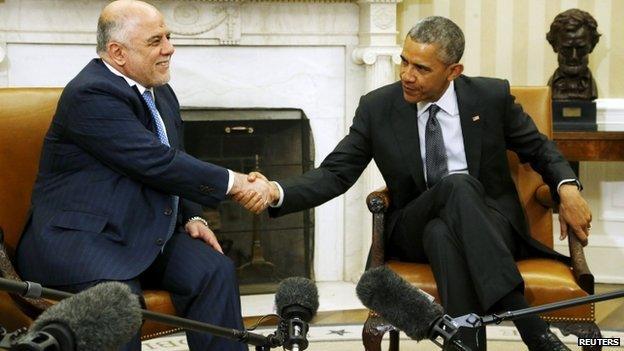 Iraq's Prime Minister Haider al-Abadi (L) and U.S. President Barack Obama shake hands after their bilateral meeting in the Oval Office at the White House in Washington on 14 April 2015.