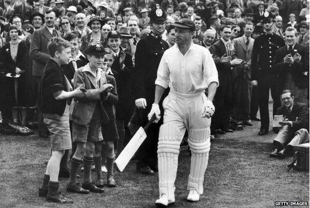 August 1938: Spectators clapping Australian cricketer Sir Don Bradman (1908 - 2001) as he comes out during the 4th Test Match at Headingley, Leeds.