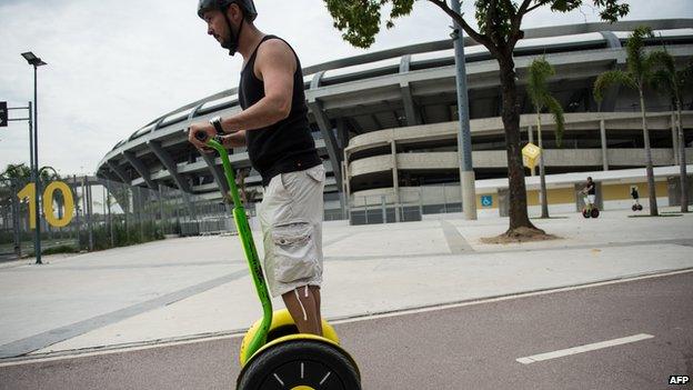 Tourists ride on a Segway in Rio de Janeiro, Brazil