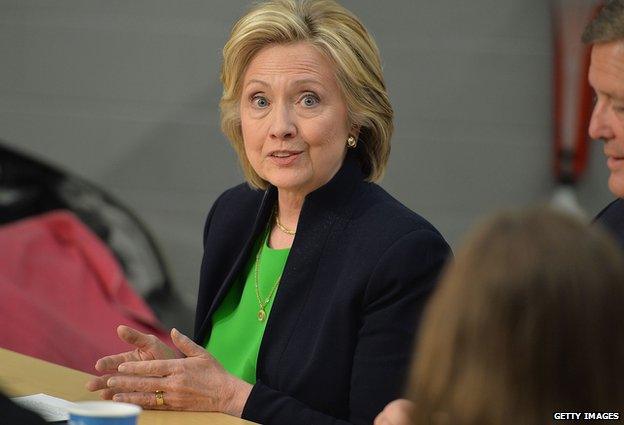 Hillary Clinton participates in a discussion in Iowa while campaigning for president