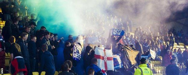 The Rangers end is covered in blue smoke