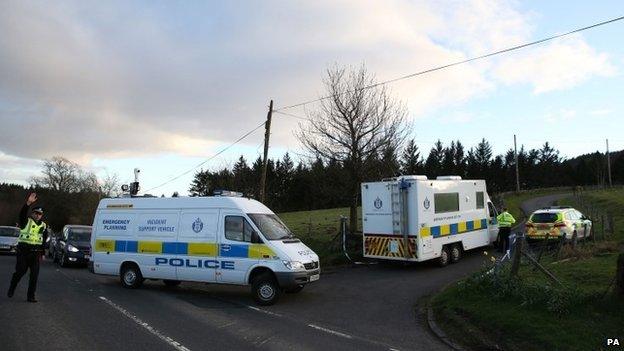 Police at the entrance to High Craigton Farm in Glasgow during the search for Irish student Karen Buckley