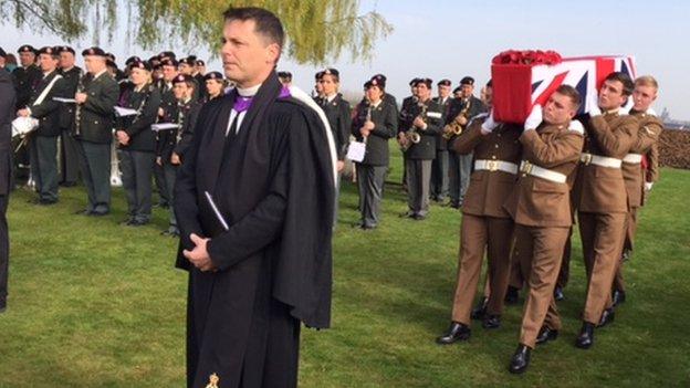 Soldiers carrying a coffin