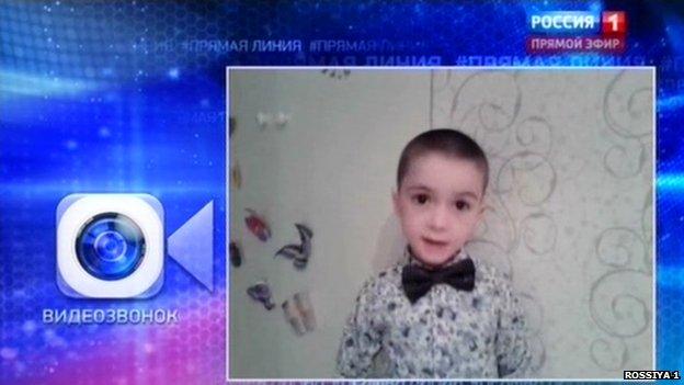 Screengrab from Russian TV showing a boy appearing on the phone-in programme