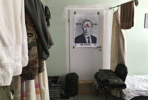 Poster of President Putin on a target in Ukrainian soldiers' rooms of the plant