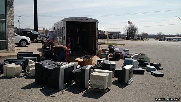 Gathering old electrical items for Joshua Furlano's recycling drive in West Salem, Wisconsin