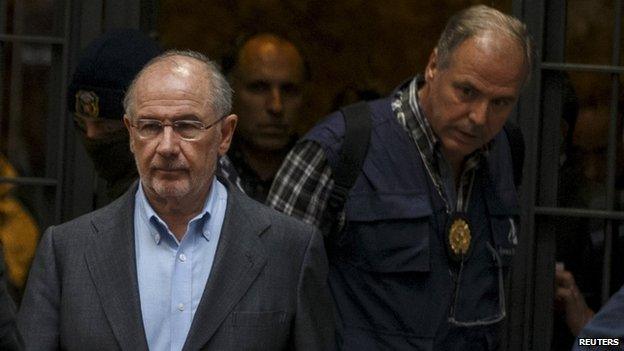 Rodrigo Rato is escorted from his home by investigators, Madrid, 16 April 2015