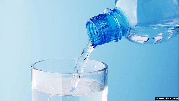 water being poured into a glass