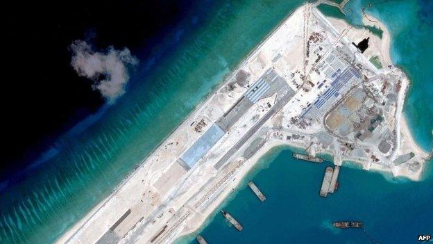 This handout photo taken on April 2, 2015 by satellite imagery provider DigitalGlobe shows a satellite image of what is claimed to be an under-construction airstrip at Fiery Cross Reef