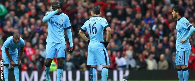 Yaya Toure and Manchester City team-mates