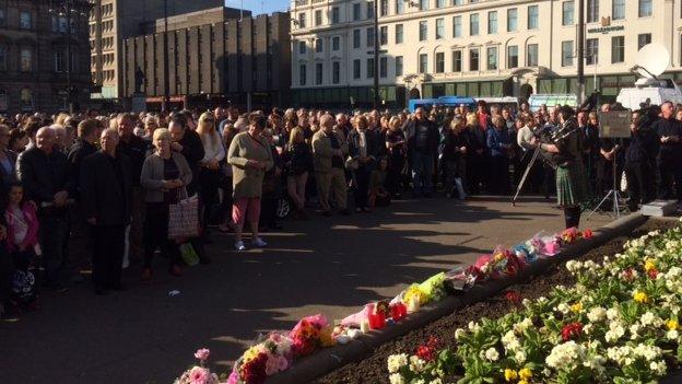 Hundreds of people attended a vigil in George Square