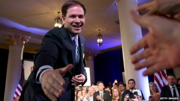 Senator Marco Rubio shakes hands after his campaign announcement.