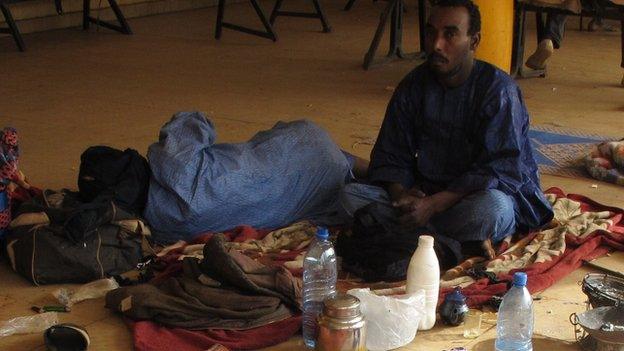 Migrants at the bus station in Gao