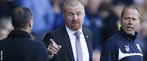 Burnley manager Sean Dyche (centre)