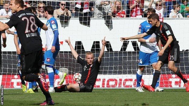 Bayern Munich's Sebastian Rode celebrates his goal against Hoffenheim