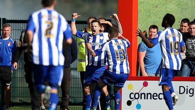 Chris Maguire celebrates Sheffield Wednesday's equaliser