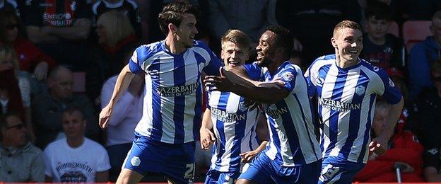 Kieran Lee celebrates with Sheffield Wednesday team mates