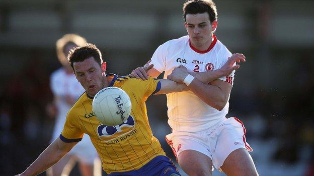 Roscommon's Diarmuid Murtagh feels the full force of Ruairi Mullan's tackle in the semi-final