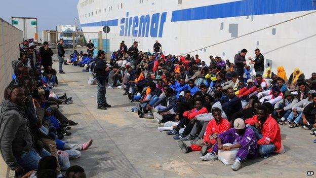 File photo: Migrants waiting to board on a cruise ship as they leave the island of Lampedusa, Southern Italy, to be transferred in Porto Empedocle, Sicily, 17 April 2015