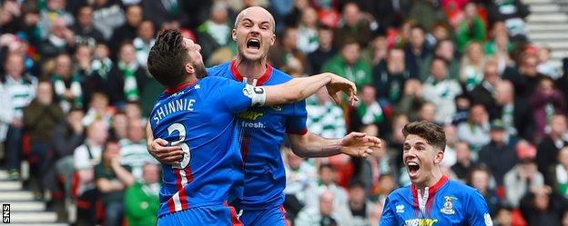 David Raven (centre) celebrates his winner against Celtic