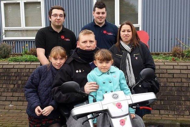 Andy McIntosh with his partner and two daughters