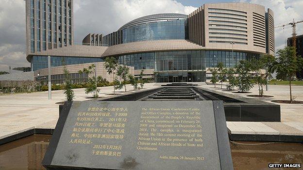 A plaque stands outside the headquarters complex of the African Union (AU), which was a gift by the government of China and completed in 2012, on March 18, 2013 in Addis Ababa, Ethiopia.