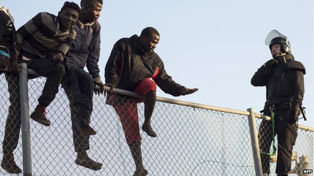 Migrants trying to enter Melilla