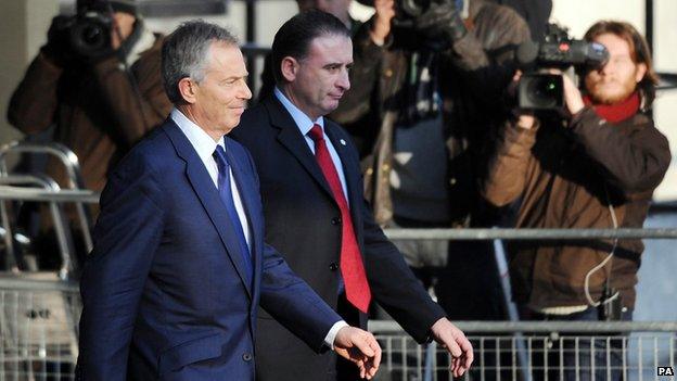 Tony Blair, pictured left, leaving the Chilcot Inquiry in January 2010