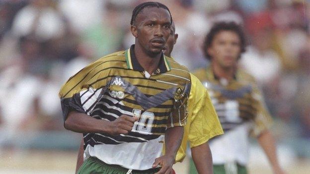 Former South African midfielder John 'Shoes' Moshoeu