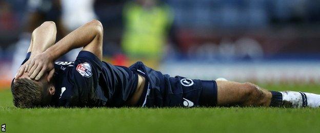 Millwall's Mark Beevers looks crestfallen