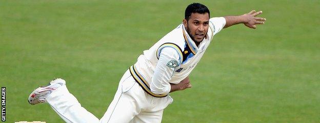 Adil Rashid bowls