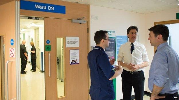 Ed Miliband and Andy Burnham during a visit to the oncology unit of the Addenbrooke's Hospital in Cambridge