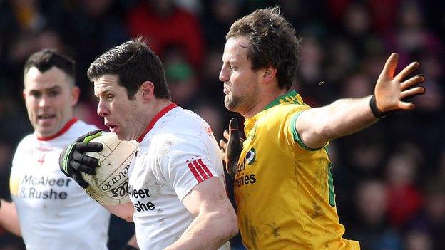 Sean Cavanagh battles with Donegal's Michael Murphy in last month's Football League game