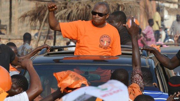 Togolese presidential candidate Jean-Pierre Fabre greets supporters in the village of Anfoin, east of the capital Lome