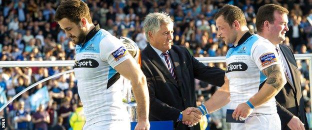 Glasgow Warriors duo Alex Dunbar and Ryan Grant collect their runners-up medals after the 2013/14 Pro12 final